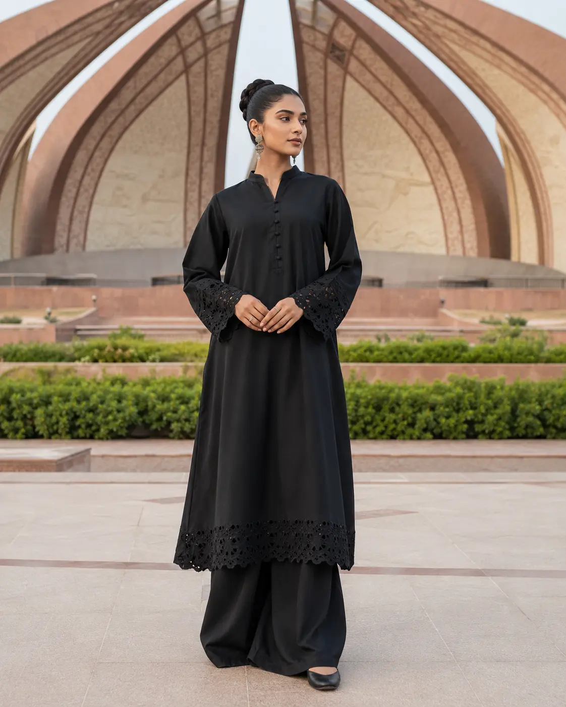 Model wearing Nilofer black shalwar kameez